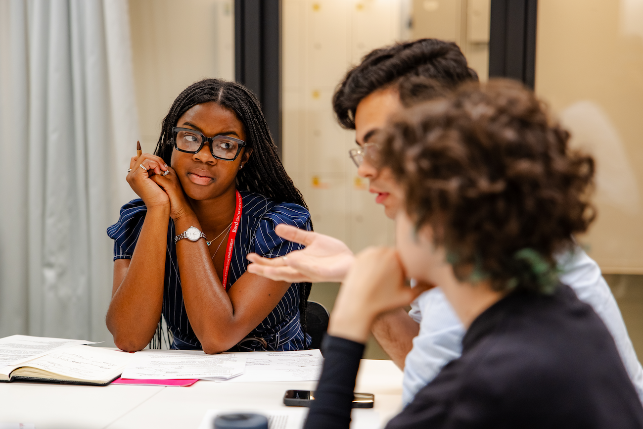 Student listening to another student at the Get Engaged Conference; Civic Engagement Workshop:&nbsp;How to Make a Website for Your Project