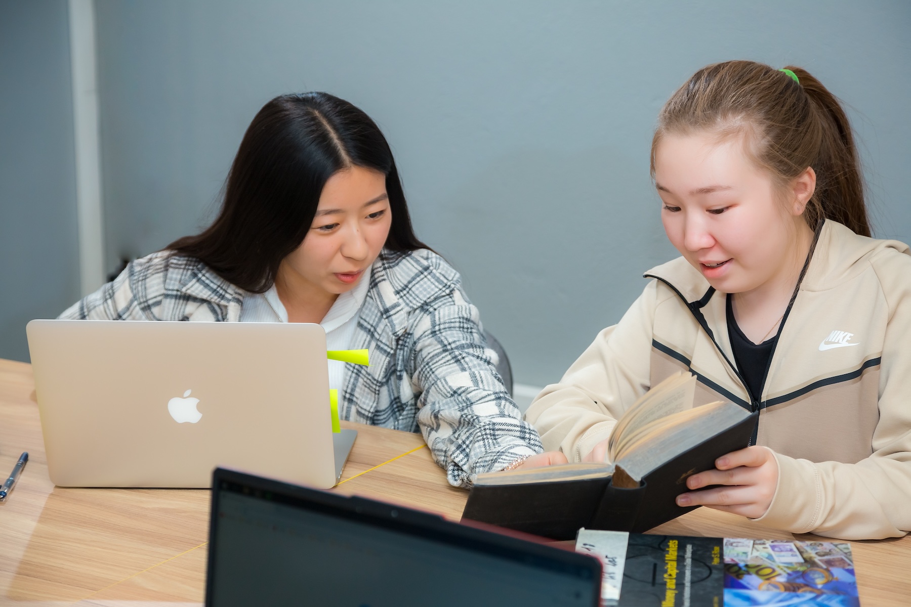 AUCA students studying together