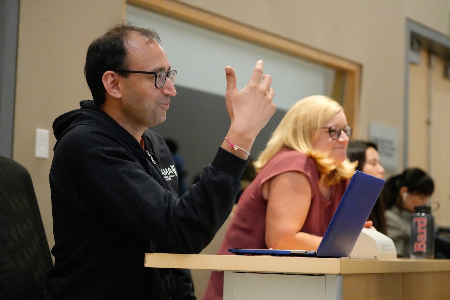 Two faculty members at a workshop